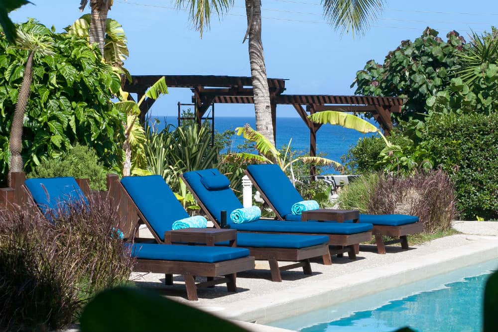 Poolside seats at our vacation rentals in anguilla